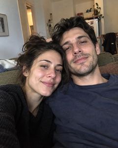 Example phone photo: a selfie of a couple on the sofa at home