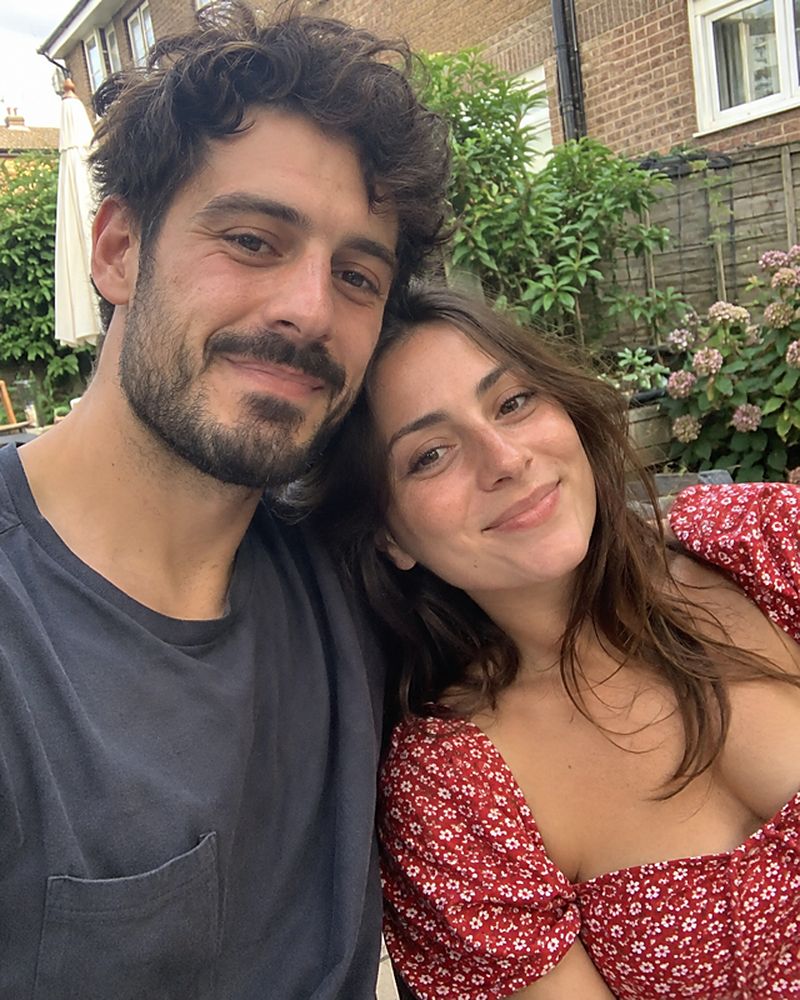 Example phone photo: a selfie of a couple in a back garden